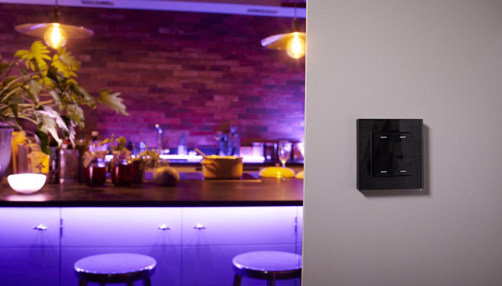 The kinetic Retrotouch Friends of Hue Smart Switch in Black Plain Glass can be stuck on any wall and don&rsquo;t require batteries or a power cable