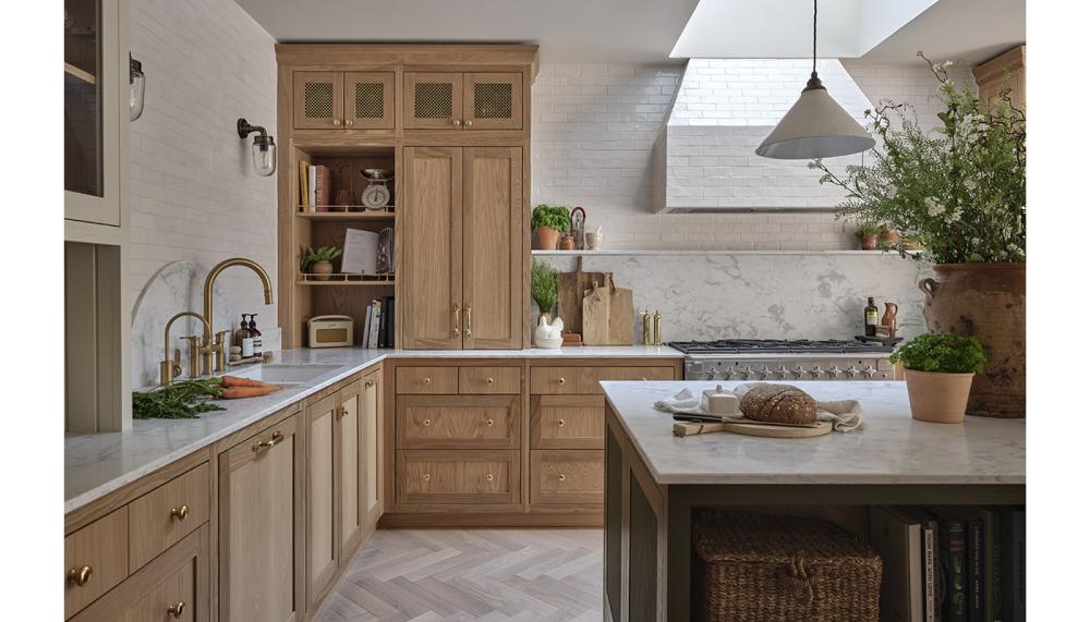 A mix of open display shelving, Shaker cabinets and mesh doors breaks up blocks in the Barnes kitchen
