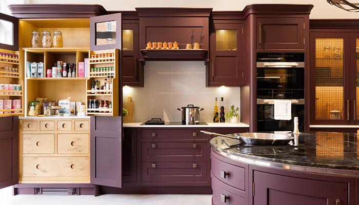 As you enter the showroom at street level, the first display is a Classic Bespoke kitchen and circular island painted in Cordoba 277 by Little Greene with appliances by Miele and Novy