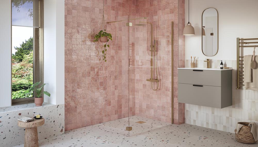 From PJH&rsquo;s Bathrooms to Love range, the RefleXion Iconix Wetroom with Hinged Splash Panel in Brushed Bronze is seen here with an optional 300mm rotatable Hinged Splash Panel, which rotates 90&deg; inwards or outwards to make the space more accessible