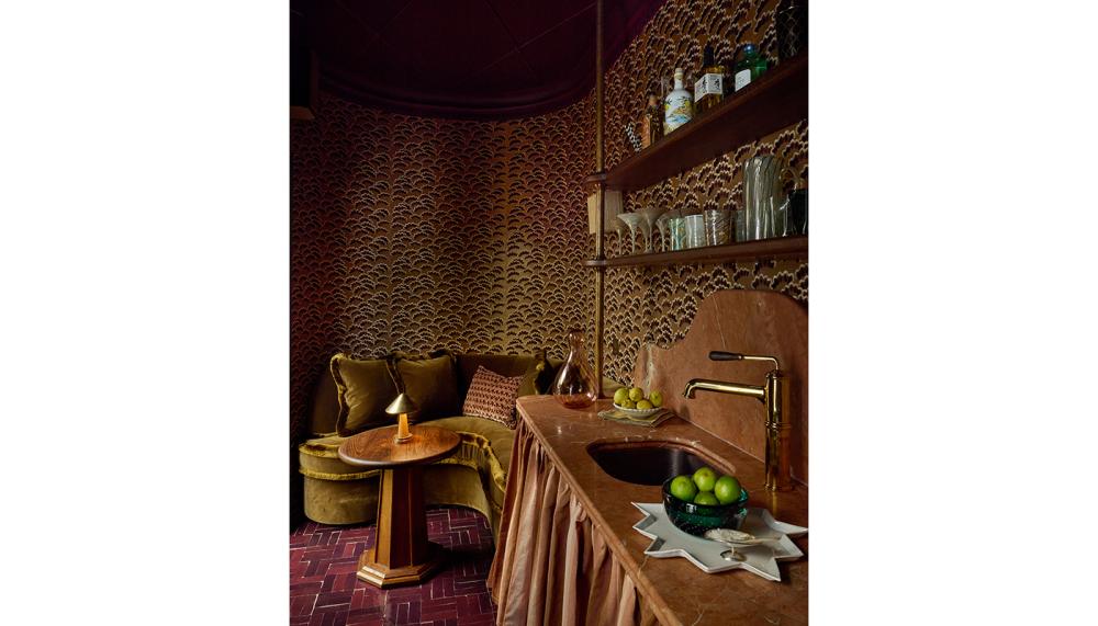 The Speakeasy features the Normandy Copper Sink and Canteen Tap by Waterworks, and Versailles Marble Rouge tiles from Ca' Pietra